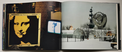 George Pusenkoff, Mona Lisa Goes Russia: the panel beside a Soviet state emblem in snow