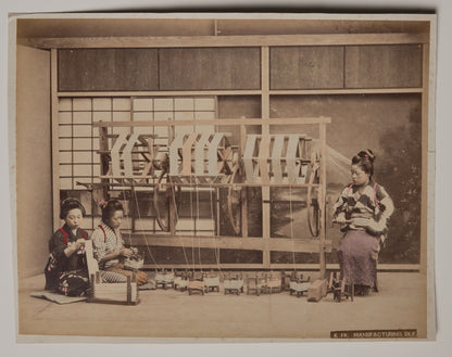 Manufacturing Silk, hand-colored Meiji albumen print: women re-reeling raw silk in the studio