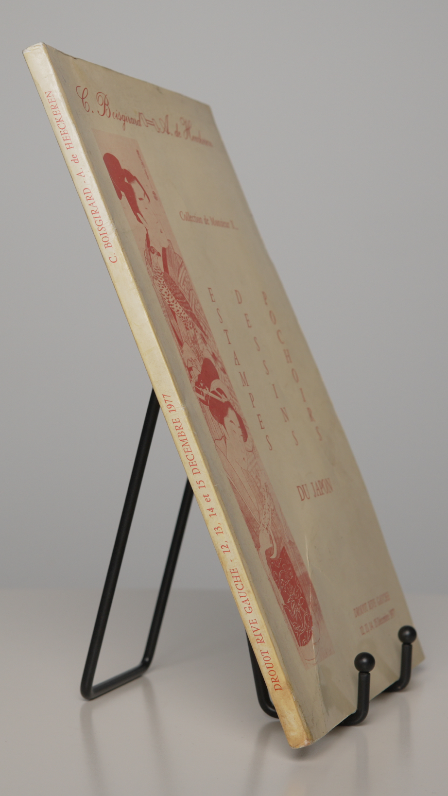 Collection de Monsieur X catalogue shown upright on a stand